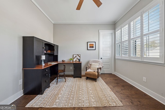 office featuring ceiling fan, dark wood-type flooring, baseboards, and ornamental molding