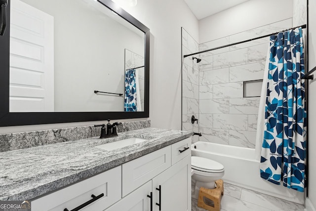 full bath featuring toilet, marble finish floor, shower / bath combo, and vanity