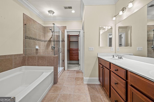 bathroom with shower with separate bathtub, vanity, tile patterned floors, and crown molding