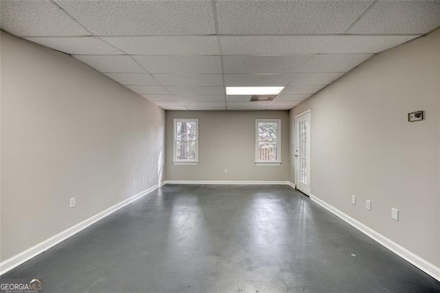 spare room featuring a drop ceiling