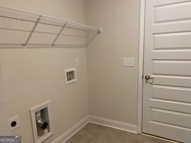 laundry area featuring hookup for a washing machine, dark carpet, and hookup for an electric dryer