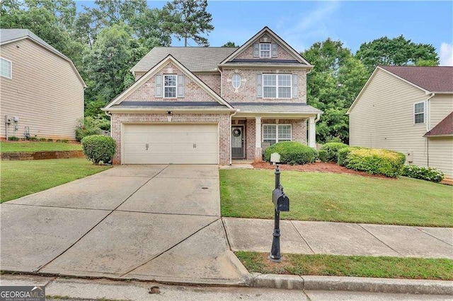 craftsman-style house with a garage and a front yard