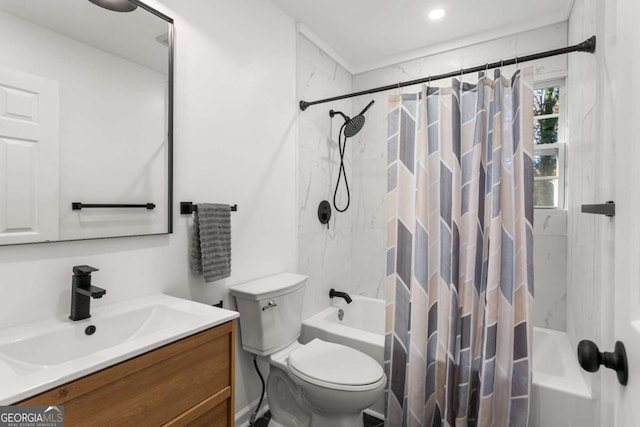 full bathroom featuring shower / tub combo with curtain, vanity, and toilet