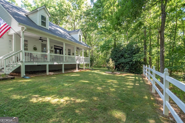 view of yard with covered porch