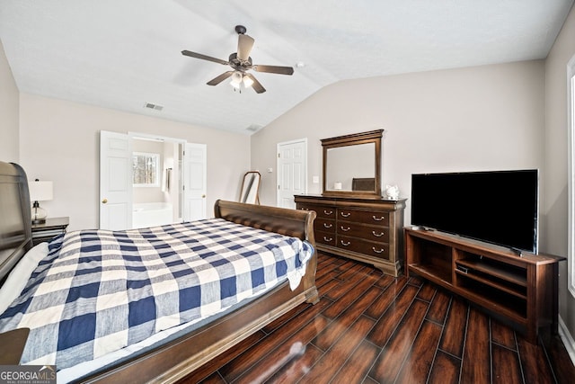 bedroom featuring vaulted ceiling, ceiling fan, and dark hardwood / wood-style floors