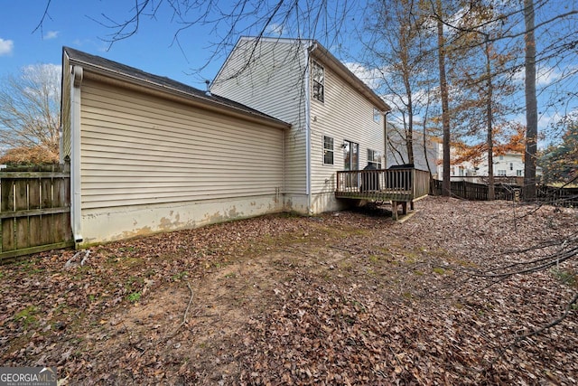 view of home's exterior with a deck