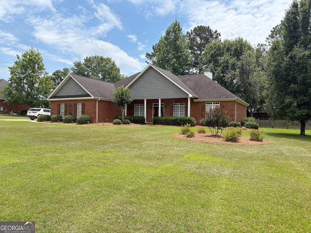 104 Red Fox Run, Dublin, GA 31021 - ranch-style house featuring brick siding and a chimney