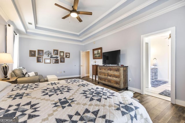 bedroom with a raised ceiling, ceiling fan, dark hardwood / wood-style flooring, and crown molding