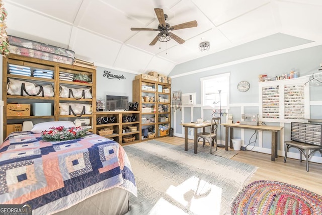 bedroom with ceiling fan and hardwood / wood-style floors