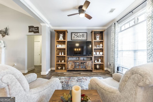 104 Red Fox Run, Dublin, GA 31021 - living area featuring baseboards, a ceiling fan, wood finished floors, ornamental molding, and ornate columns
