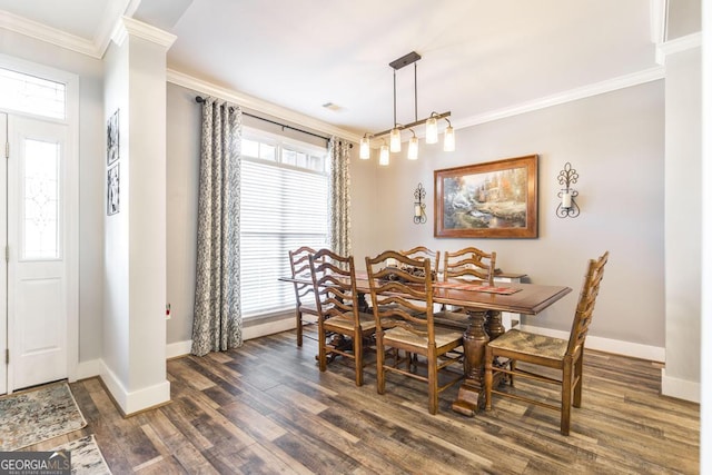 104 Red Fox Run, Dublin, GA 31021 - dining space featuring baseboards, ornamental molding, dark wood-style flooring, decorative columns, and plenty of natural light
