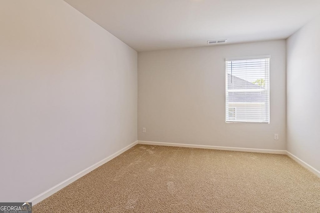 empty room featuring carpet