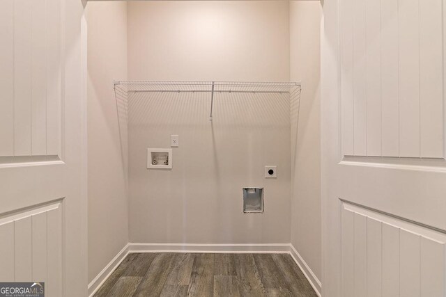 laundry room with dark hardwood / wood-style flooring, hookup for a washing machine, and hookup for an electric dryer