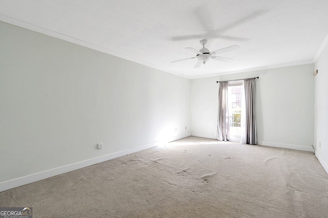 6851 Roswell Rd Unit D14, Atlanta, GA 30328 - unfurnished room featuring ornamental molding, ceiling fan, and light carpet