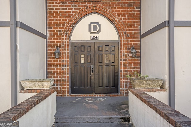 6851 Roswell Rd Unit D14, Atlanta, GA 30328 - doorway to property featuring brick siding