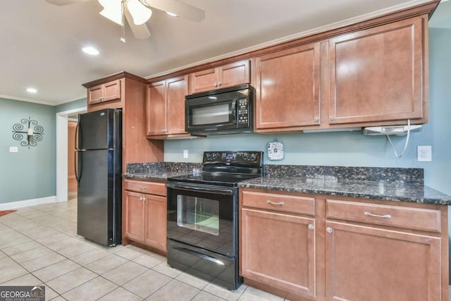 kitchen with light tile patterned flooring, ceiling fan, dark stone countertops, and black appliances