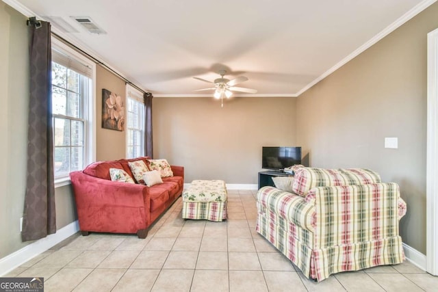 living room featuring light tile patterned floors, ceiling fan, and ornamental molding