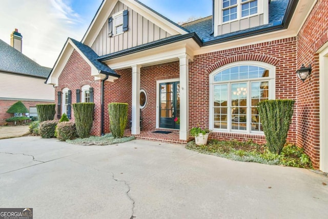 doorway to property featuring a patio