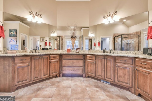 bathroom with walk in shower, vanity, high vaulted ceiling, and a notable chandelier