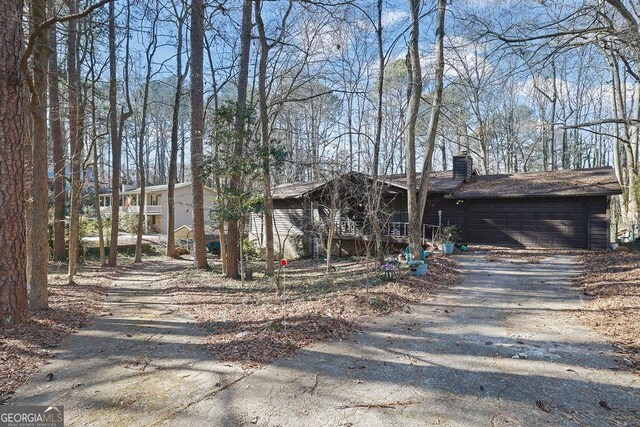 ranch-style home with a garage