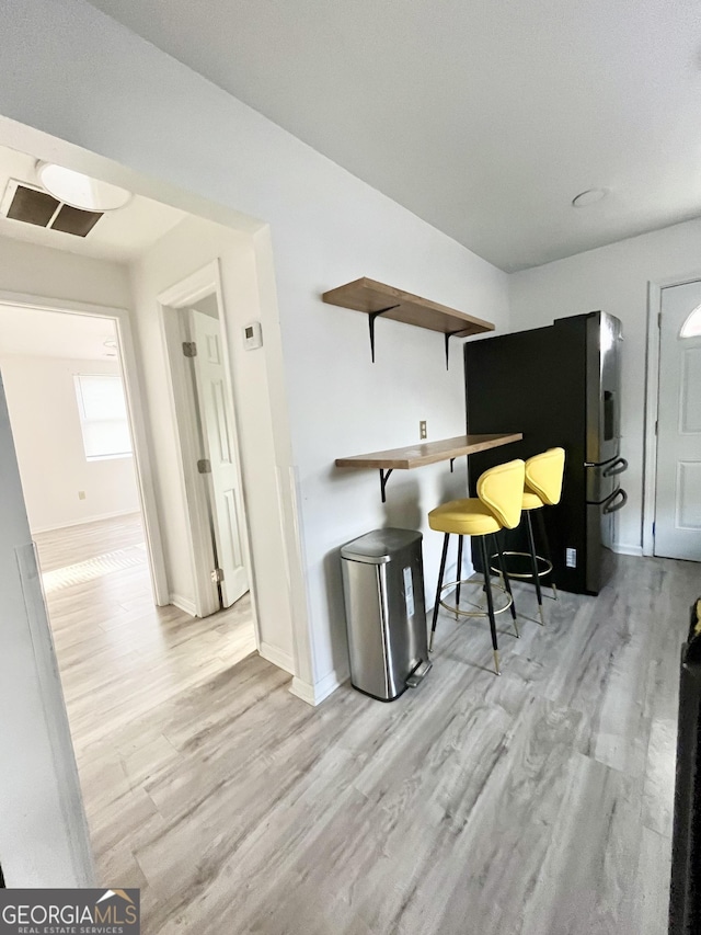 interior space featuring light wood-type flooring