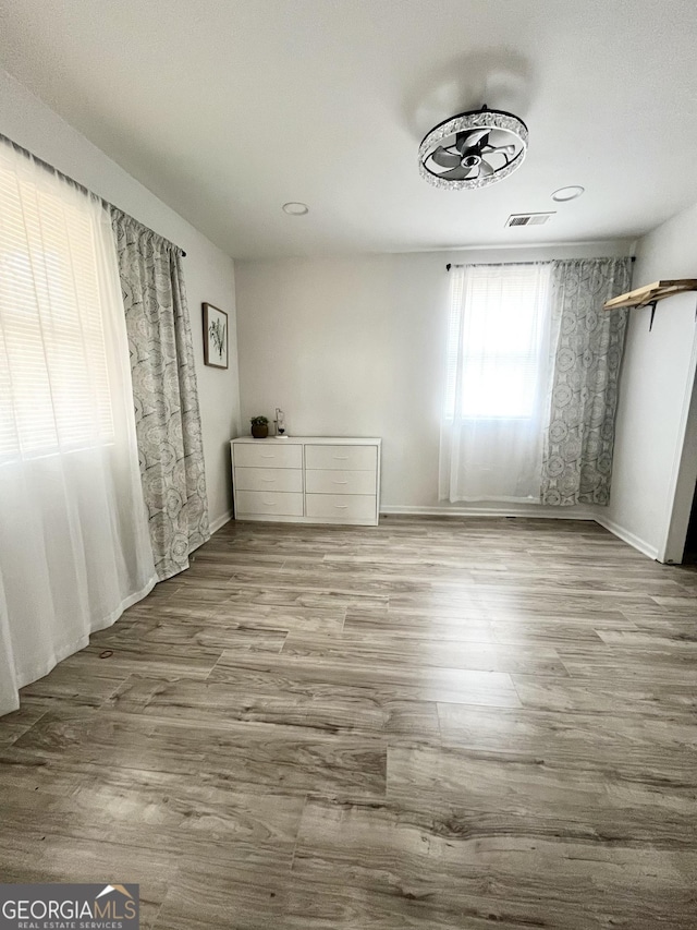 unfurnished bedroom featuring light hardwood / wood-style flooring