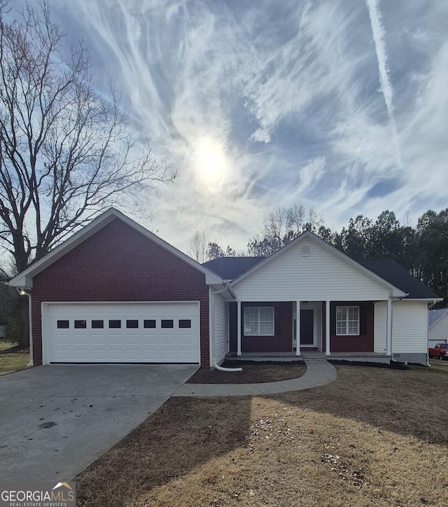 ranch-style house featuring a garage