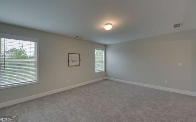 1721 Cobblefield Cir, Dacula, GA 30019 - carpeted spare room featuring baseboards