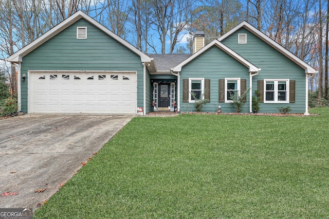 single story home featuring a garage and a front lawn