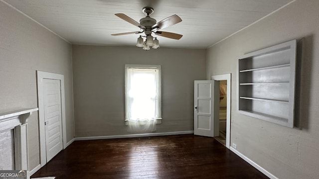 interior space featuring ceiling fan and dark wood-type flooring