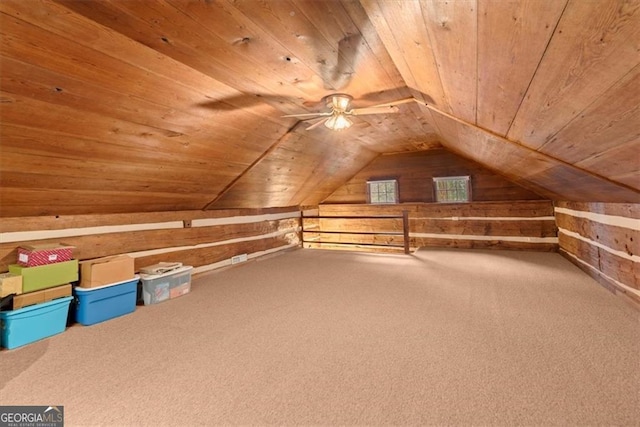 additional living space featuring carpet flooring, ceiling fan, wooden ceiling, and lofted ceiling