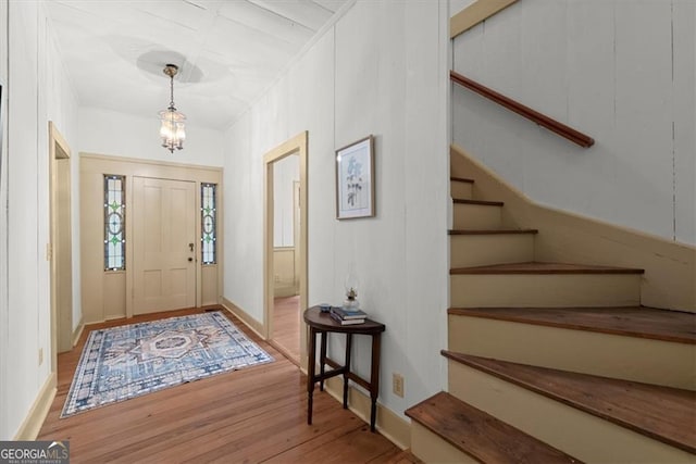 foyer entrance with light hardwood / wood-style flooring