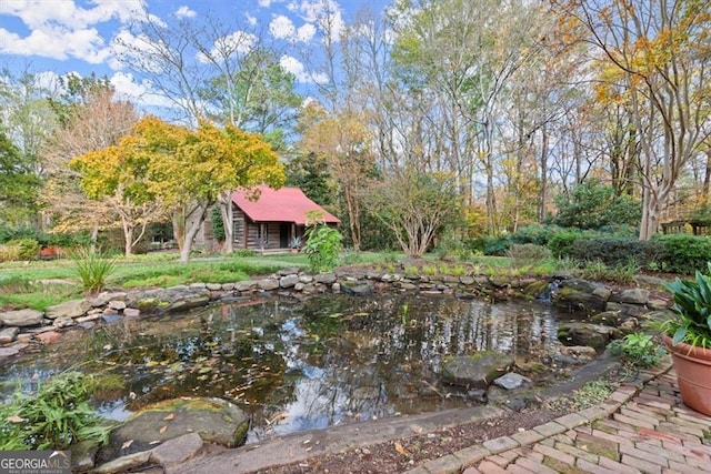 exterior space with a water view