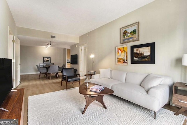 living room with hardwood / wood-style floors