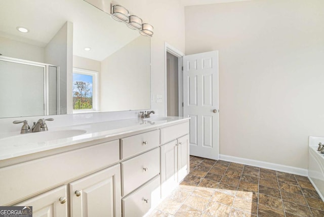 bathroom with plus walk in shower and vanity