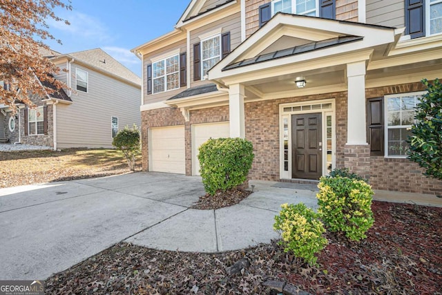 view of front of property featuring a garage