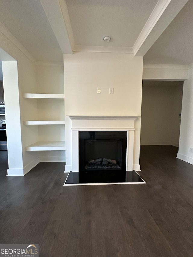 details featuring ornamental molding, built in shelves, a textured ceiling, hardwood / wood-style floors, and stainless steel electric range