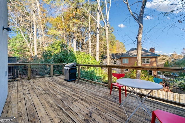 deck featuring grilling area