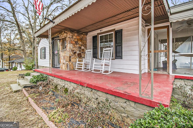 entrance to property featuring a porch