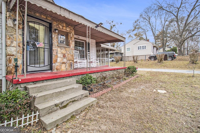 exterior space featuring covered porch