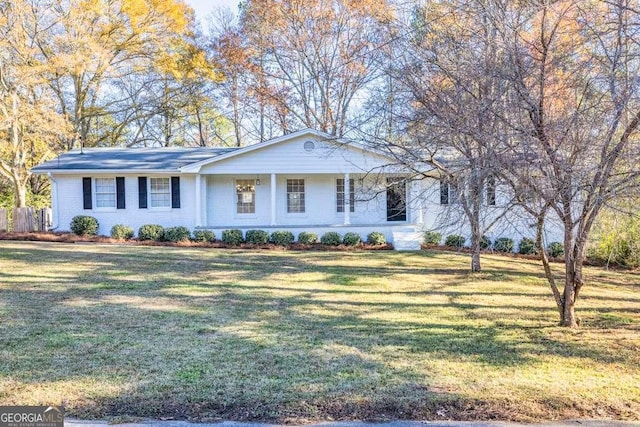 single story home featuring a front yard