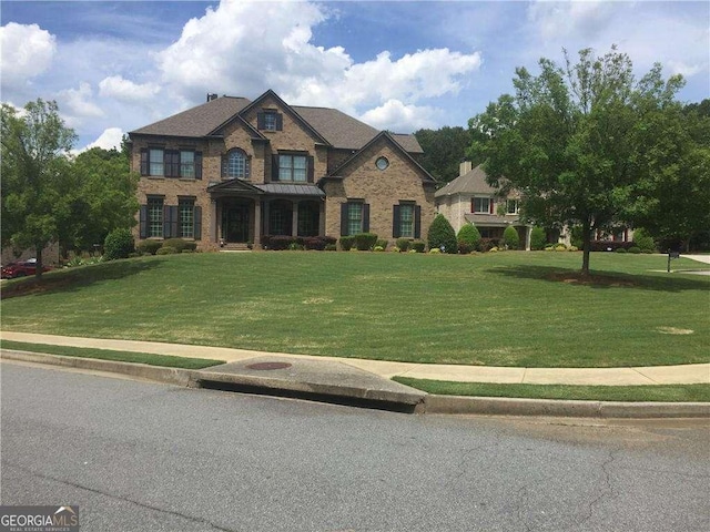 view of front of home with a front lawn