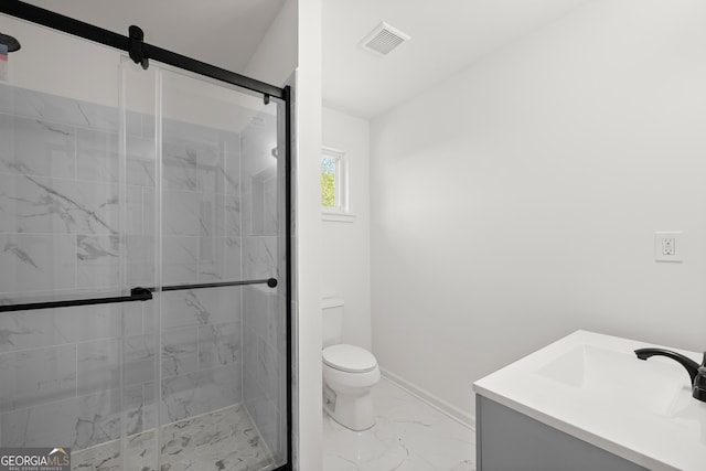 bathroom featuring walk in shower, vanity, and toilet