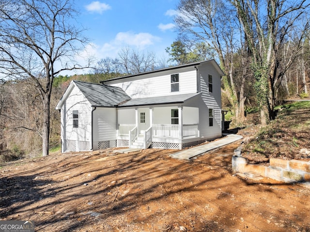 front of property featuring covered porch