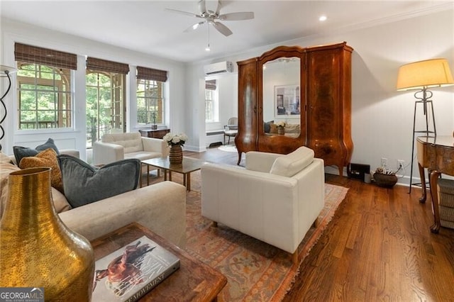 living room featuring a wall mounted air conditioner, ceiling fan, dark hardwood / wood-style flooring, and ornamental molding