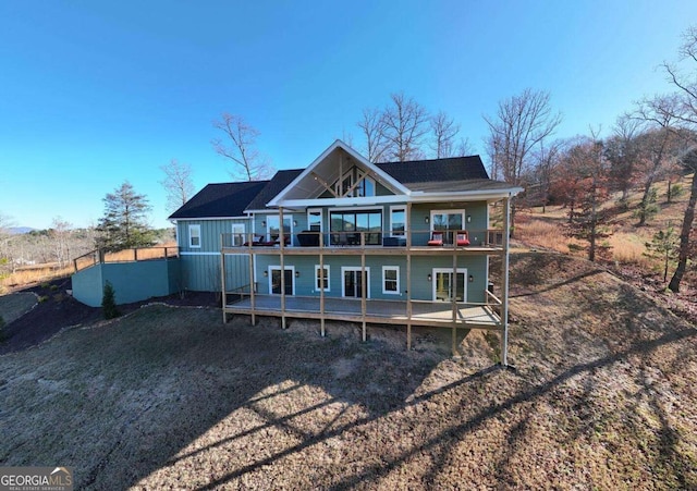 rear view of house with a balcony