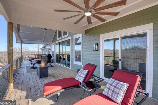 wooden terrace with ceiling fan