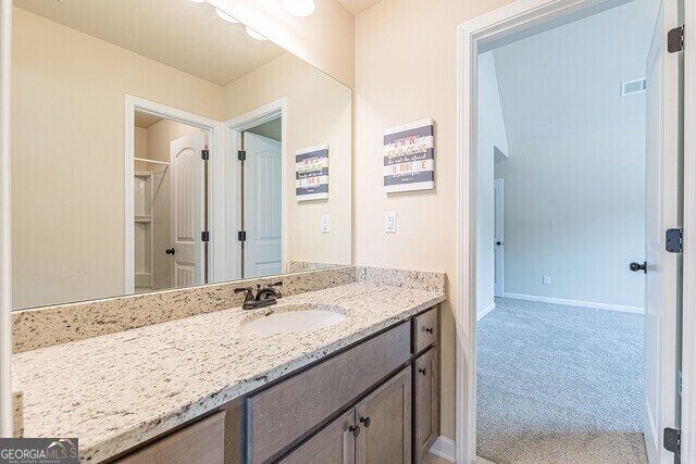 bathroom featuring vanity