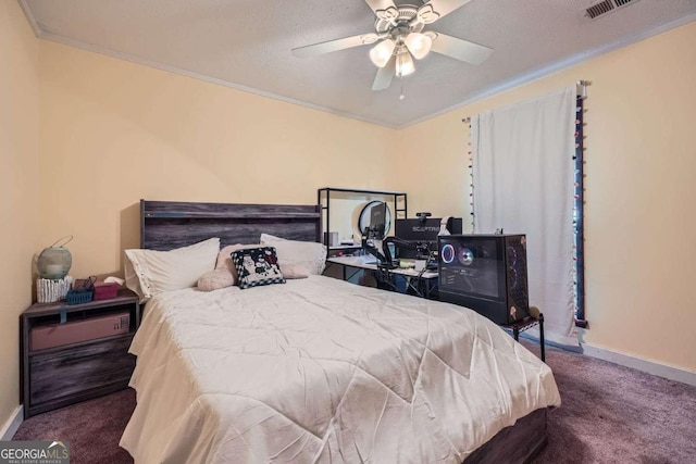 bedroom with dark colored carpet, ceiling fan, ornamental molding, and a textured ceiling