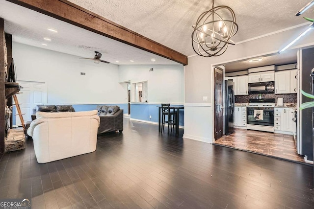 living room with ceiling fan with notable chandelier, a textured ceiling, lofted ceiling with beams, and dark wood-type flooring